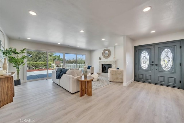 29461 Via Valverde, Laguna Niguel, CA 92677 - living area featuring light wood-style flooring, baseboards, recessed lighting, and a fireplace