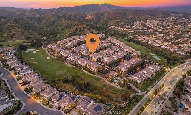bird's eye view featuring a mountain view and a residential view