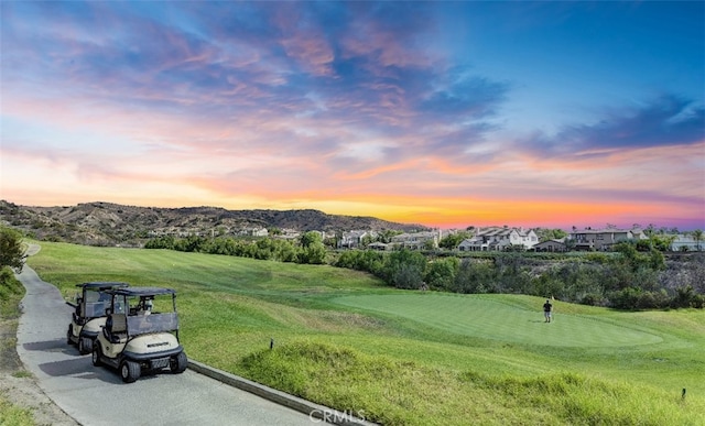 view of community featuring a mountain view and golf course view