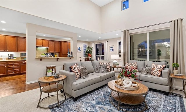 living area featuring recessed lighting and wood finished floors