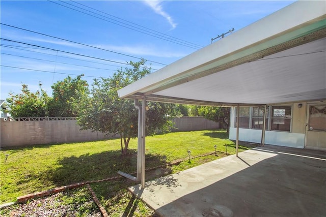 view of yard featuring a patio area and a fenced backyard