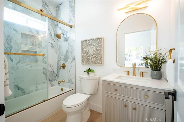 1933 Fanwood Ave, Long Beach, CA 90815 - full bathroom with vanity, bath / shower combo with glass door, and wood finished floors