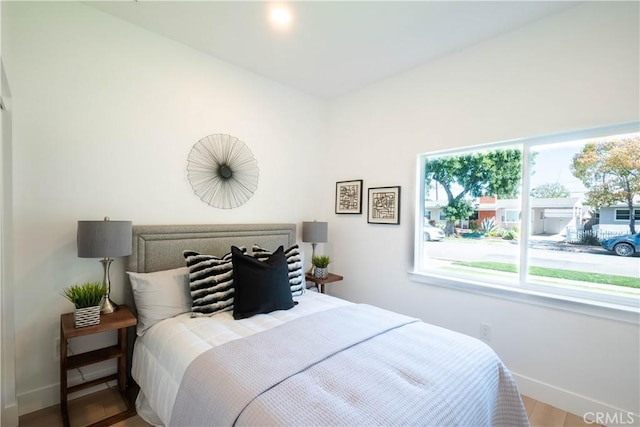1933 Fanwood Ave, Long Beach, CA 90815 - bedroom with baseboards and wood finished floors