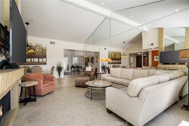 175 Bouquet Canyon Dr, Palm Desert, CA 92211 - living room with a warm lit fireplace, high vaulted ceiling, visible vents, and beam ceiling