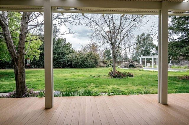 deck featuring a yard