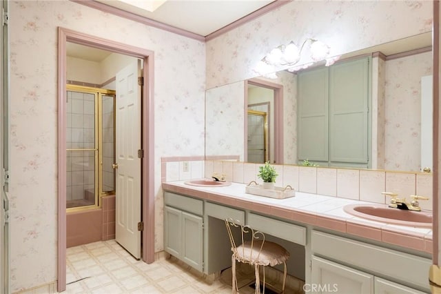full bathroom with tile patterned floors, enclosed tub / shower combo, double vanity, and a sink