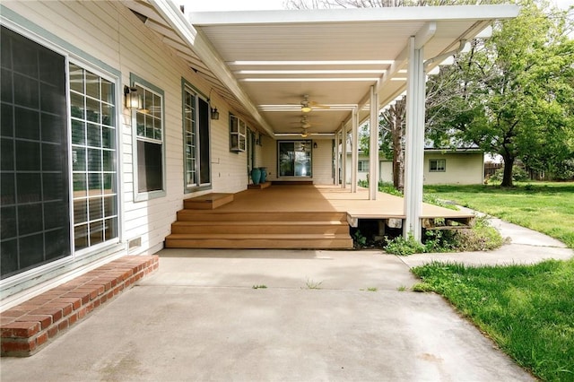 view of patio featuring ceiling fan and a porch