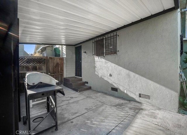 3654 7th Ave, Los Angeles, CA 90018 - view of patio featuring area for grilling, fence, and entry steps