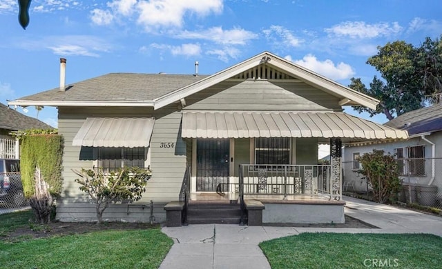 3654 7th Ave, Los Angeles, CA 90018 - bungalow-style house with a porch