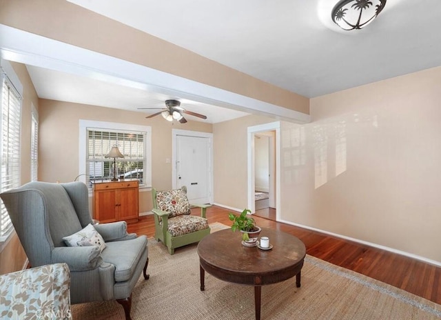 3654 7th Ave, Los Angeles, CA 90018 - living room featuring baseboards, light wood finished floors, and plenty of natural light