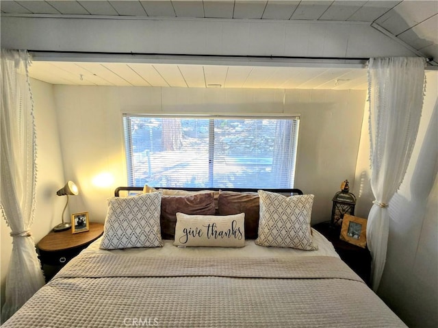 bedroom featuring multiple windows