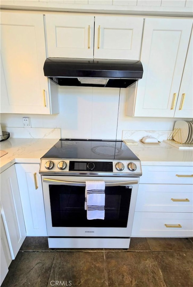 kitchen featuring electric stove, white cabinets, and under cabinet range hood
