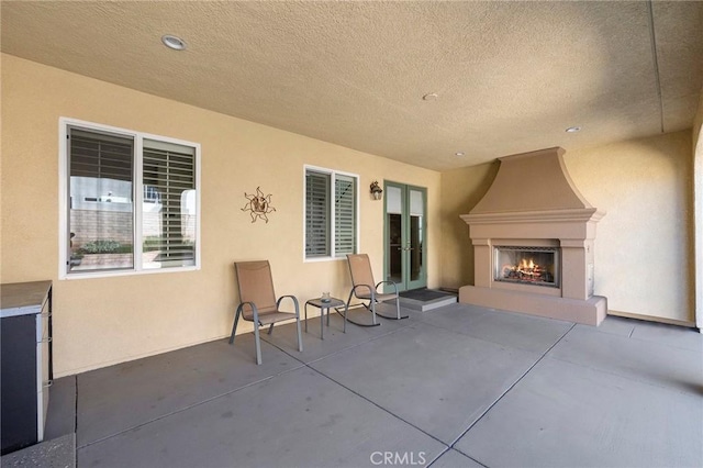 3274 Rural Ln, Corona, CA 92882 - view of patio / terrace featuring a large fireplace