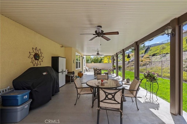 3274 Rural Ln, Corona, CA 92882 - view of patio featuring outdoor dining space, fence, and ceiling fan