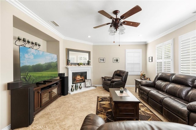 3274 Rural Ln, Corona, CA 92882 - living room with a glass covered fireplace, light tile patterned floors, visible vents, ceiling fan, and ornamental molding