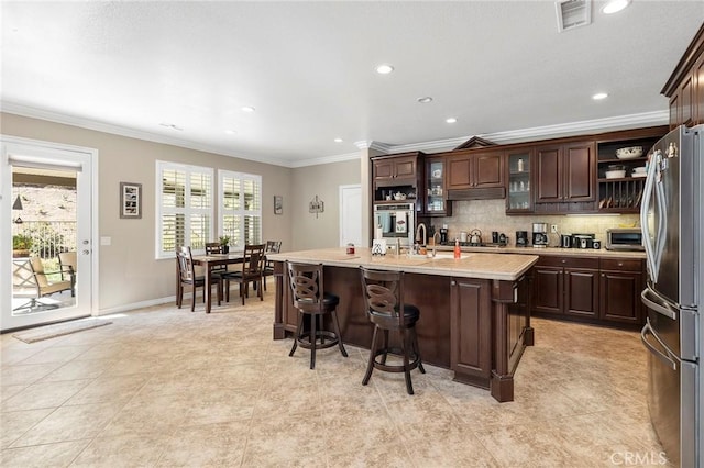 3274 Rural Ln, Corona, CA 92882 - kitchen featuring light countertops, open shelves, stainless steel appliances, decorative backsplash, and dark brown cabinets