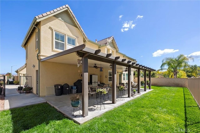 3274 Rural Ln, Corona, CA 92882 - back of property with a fenced backyard, stucco siding, a patio, and a ceiling fan