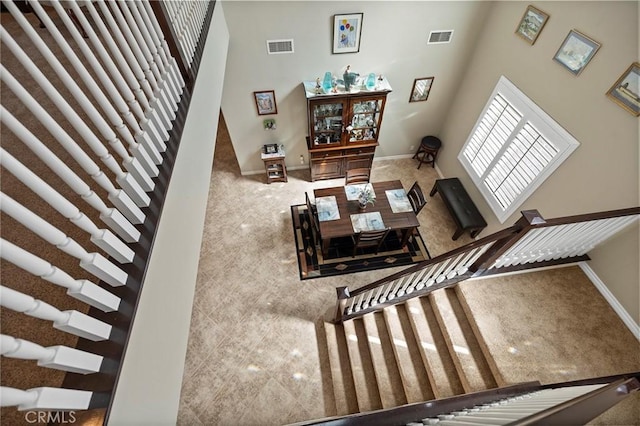 3274 Rural Ln, Corona, CA 92882 - living room featuring baseboards, stairs, and visible vents