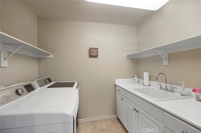 3274 Rural Ln, Corona, CA 92882 - laundry room with independent washer and dryer, light tile patterned floors, baseboards, a sink, and cabinet space