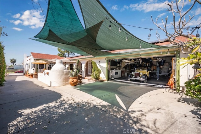 exterior space featuring a garage and driveway
