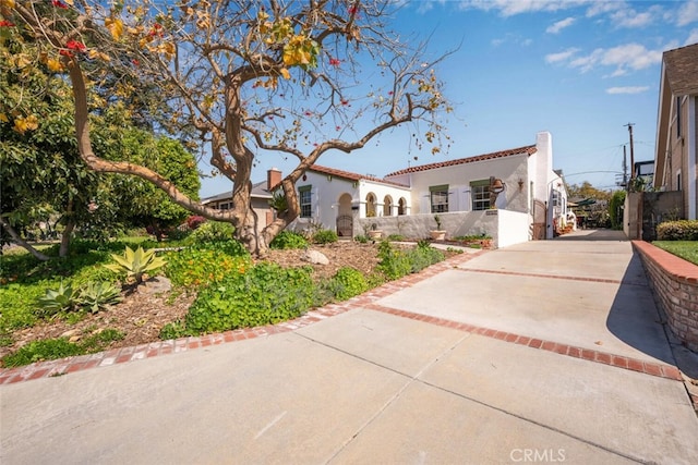 mediterranean / spanish-style home featuring stucco siding