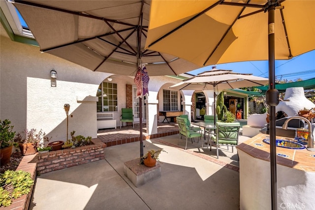 view of patio / terrace with a sink