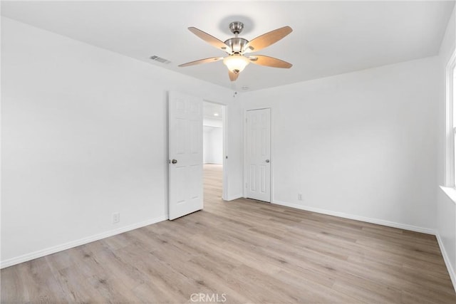 6010 S Verdun Ave, Los Angeles, CA 90043 - spare room featuring ceiling fan, light wood finished floors, and baseboards