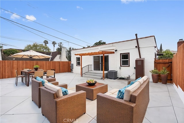 6010 S Verdun Ave, Los Angeles, CA 90043 - view of patio featuring outdoor lounge area, central air condition unit, a fenced backyard, and outdoor dining area