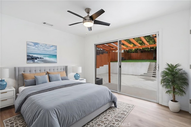 6010 S Verdun Ave, Los Angeles, CA 90043 - bedroom featuring access to outside, light wood finished floors, and ceiling fan