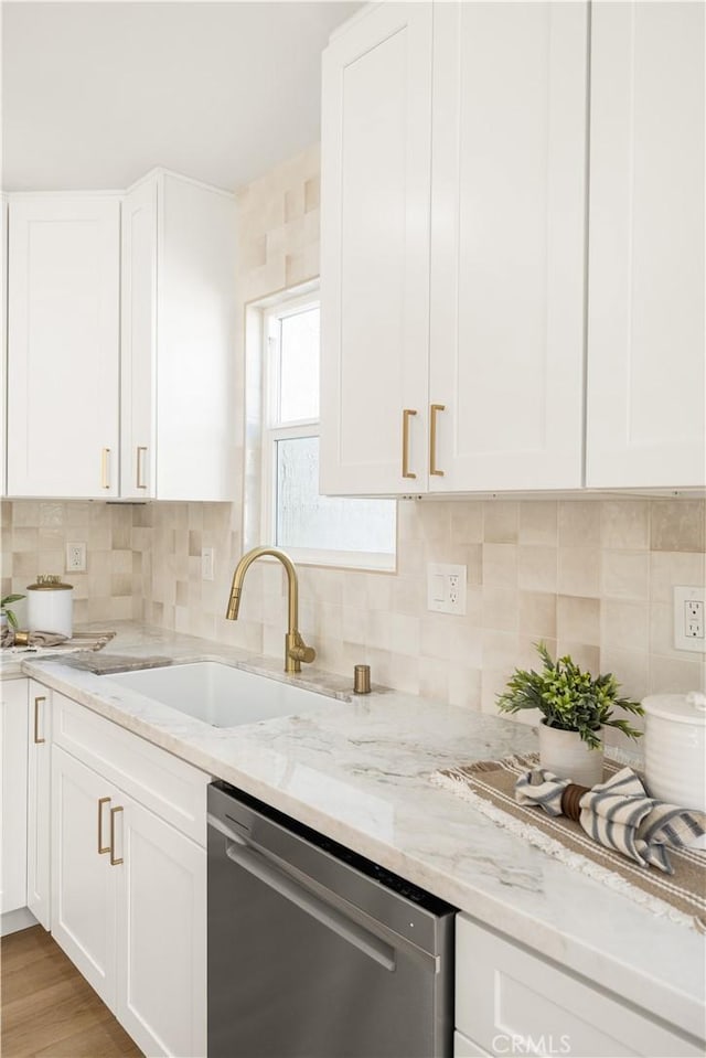 3748 Marber Ave, Long Beach, CA 90808 - kitchen featuring dishwasher, a sink, white cabinets, light stone countertops, and backsplash