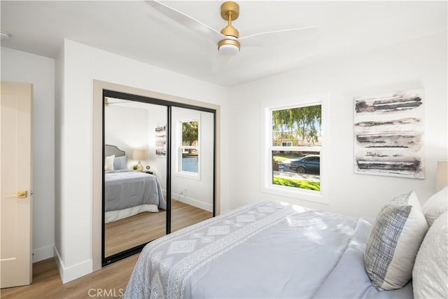 3748 Marber Ave, Long Beach, CA 90808 - bedroom with light wood-type flooring, baseboards, a closet, and a ceiling fan