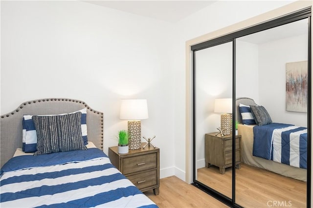 3748 Marber Ave, Long Beach, CA 90808 - bedroom featuring wood finished floors and baseboards