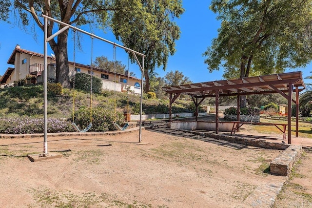 view of property's community featuring a pergola
