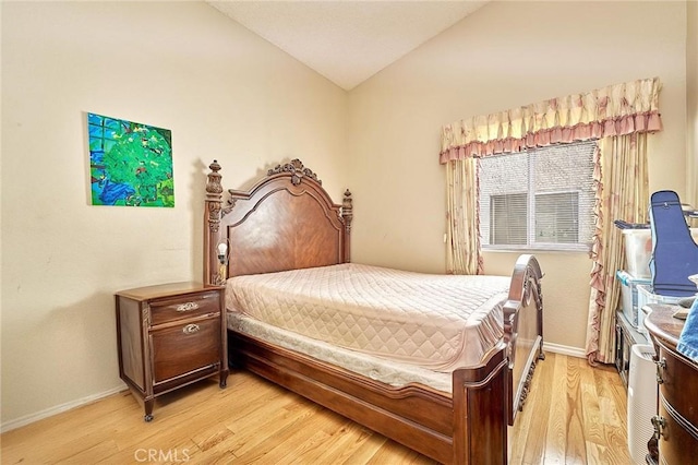 1135 Summitridge Dr, Diamond Bar, CA 91765 - bedroom featuring baseboards, lofted ceiling, and light wood finished floors