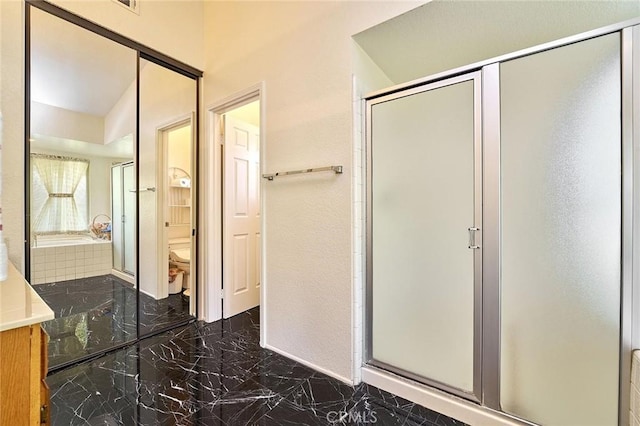 1135 Summitridge Dr, Diamond Bar, CA 91765 - full bath featuring a bath, marble finish floor, toilet, and a stall shower