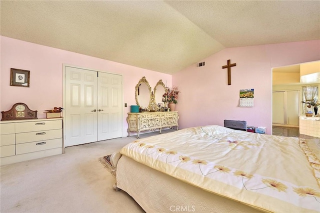 1135 Summitridge Dr, Diamond Bar, CA 91765 - bedroom featuring lofted ceiling, light colored carpet, a textured ceiling, visible vents, and a closet