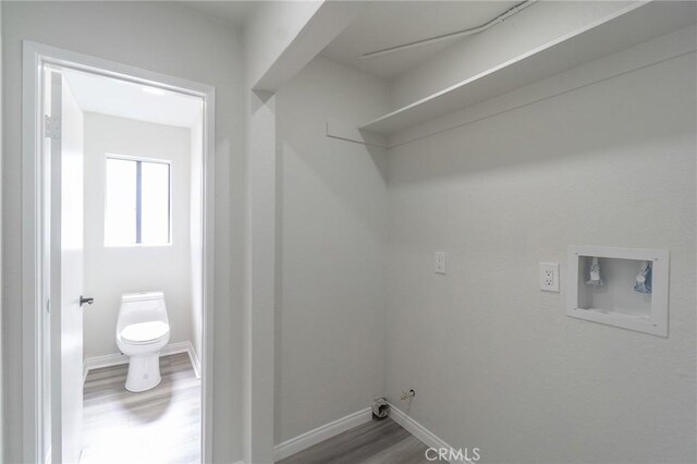4706 W 168th St, Lawndale, CA 90260 - washroom with gas dryer hookup, wood finished floors, and hookup for a washing machine