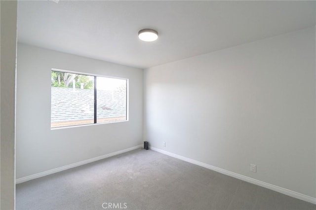 4706 W 168th St, Lawndale, CA 90260 - carpeted empty room with baseboards
