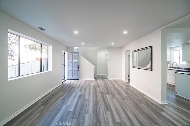 4706 W 168th St, Lawndale, CA 90260 - unfurnished living room with wood finished floors and recessed lighting