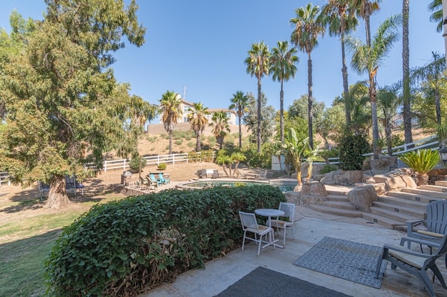 view of patio with fence