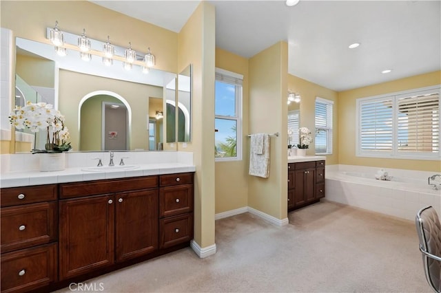 16720 S Peak Ct, Riverside, CA 92503 - bathroom with vanity, a bath, and recessed lighting