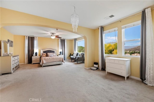 16720 S Peak Ct, Riverside, CA 92503 - bedroom with arched walkways, carpet, and a ceiling fan