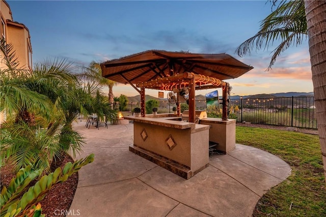 16720 S Peak Ct, Riverside, CA 92503 - fenced backyard with a patio area, exterior kitchen, and a gazebo