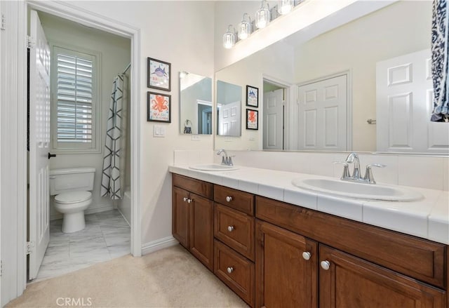 16720 S Peak Ct, Riverside, CA 92503 - full bathroom featuring double vanity, shower / bath combo, and marble finish flooring