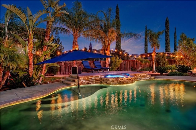 16720 S Peak Ct, Riverside, CA 92503 - view of swimming pool featuring a pool with connected hot tub and a patio area
