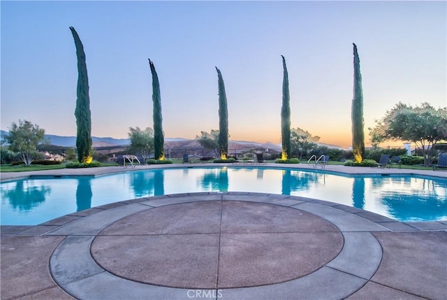 16720 S Peak Ct, Riverside, CA 92503 - pool at dusk featuring a community pool