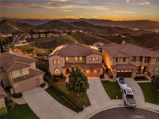 16720 S Peak Ct, Riverside, CA 92503 - view of front of house featuring concrete driveway, a tiled roof, and an attached garage