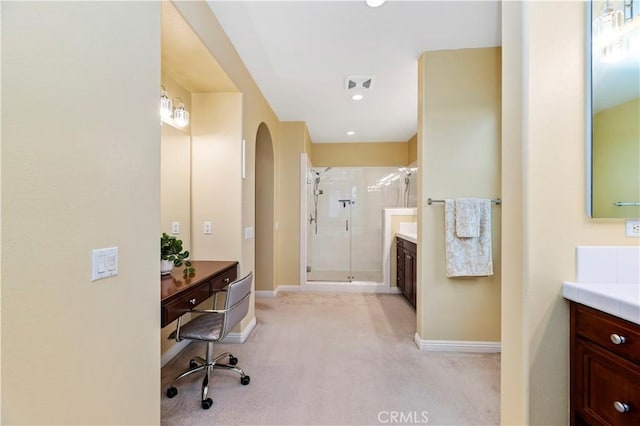 16720 S Peak Ct, Riverside, CA 92503 - full bathroom featuring two vanities, a shower stall, and recessed lighting