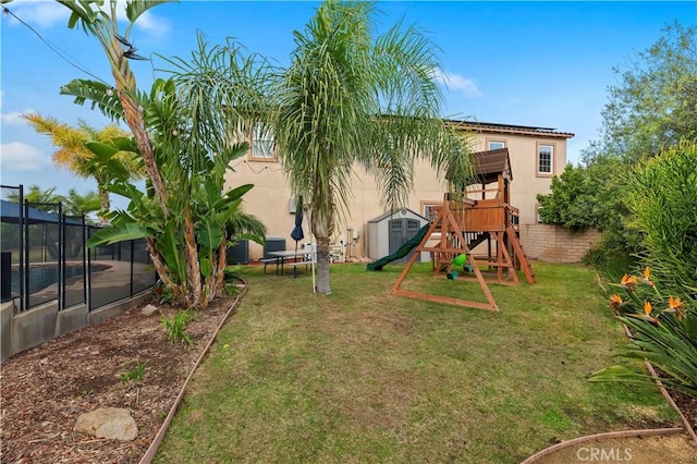 16720 S Peak Ct, Riverside, CA 92503 - view of yard featuring a playground and a storage unit