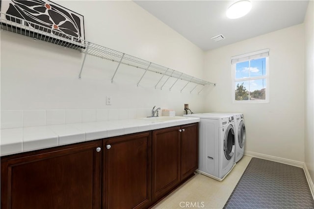 16720 S Peak Ct, Riverside, CA 92503 - laundry area featuring cabinet space and separate washer and dryer